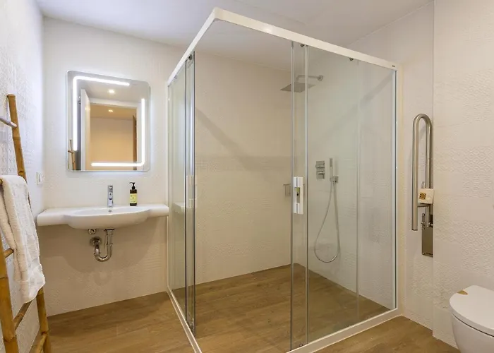 Caleyro Boutique - Parking Incluido Appart hôtel