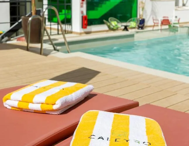 Caleyro Boutique - Parking Incluido Appart hôtel